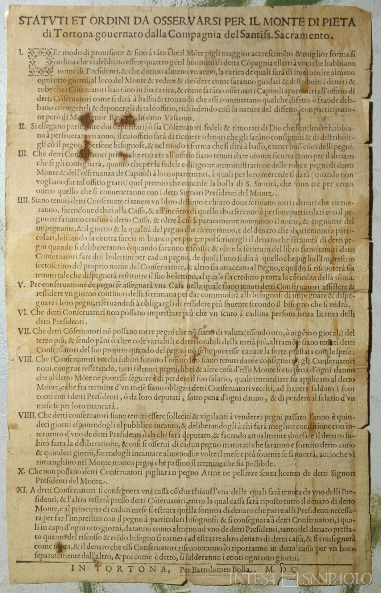 Monte di credito su pegno di Tortona, copia a stampa del 1600 dei primi statuti e capitoli del Monte di Pietà, tratto da Storia, arte e restauri nel Tortonese, 1993, p. 68